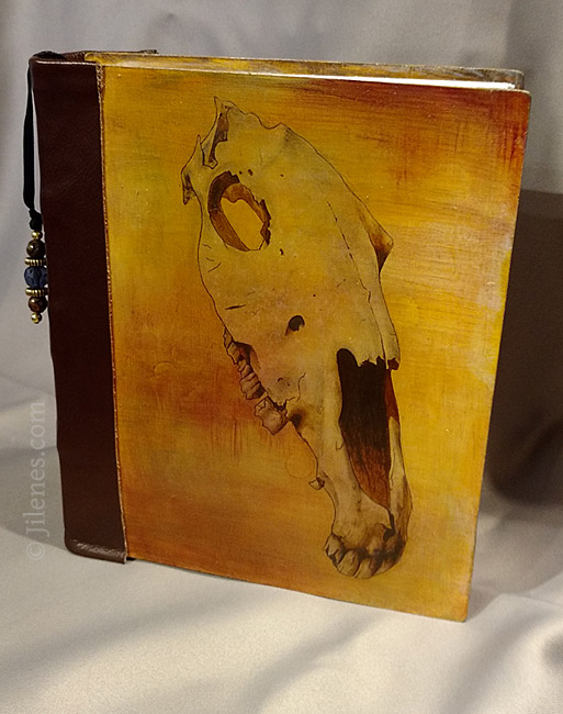 Hard cover hand bound journal with horse skull
